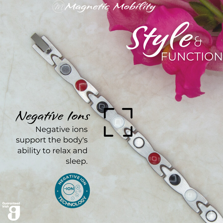 Snapdragon Moon 4in1 magnetic bracelet by Magnetic Mobility, highlighting the negative ions feature which supports the body's ability to relax and sleep. Ideal for reducing stress and promoting better health.