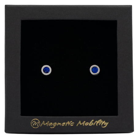 Magnetic Mobility September Birthstone Stud Earrings featuring saphire blue Swarovski crystals, elegantly presented in a black box with Magnetic Mobility branding. These magnetic back earrings offer stylish pain relief.